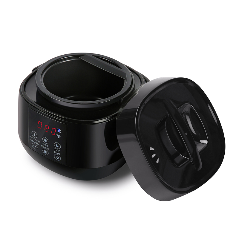 Maliit na wax-melting pot na may itim na hawakan